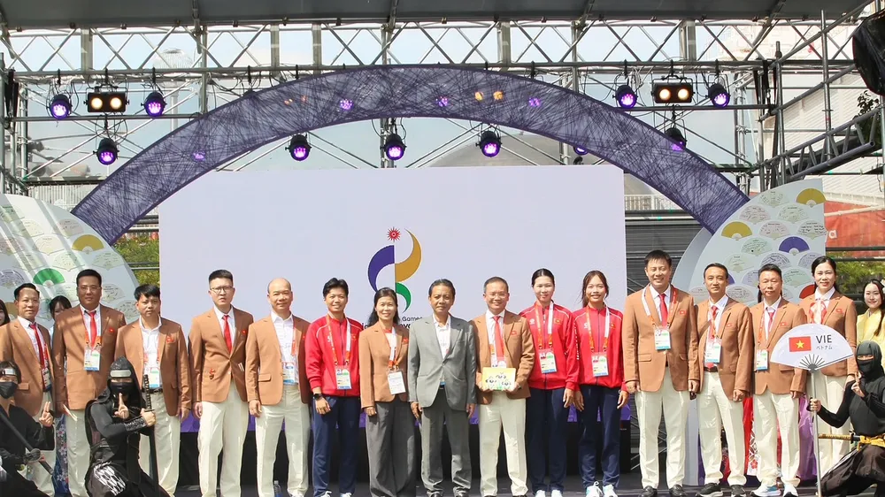 Đoàn thể thao Việt Nam tham dự Lễ thượng cờ của Ban tổ chức ASIAD 20. Ảnh: ĐOÀN TTVN
