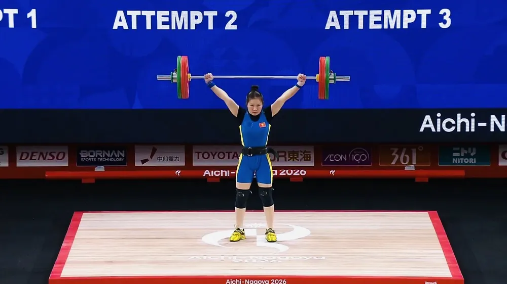 Lực sĩ Quàng Thị Tâm thi đấu hạng cân 57kg nữ tại ASIAD 20. Ảnh: PHÙNG CƯỜNG