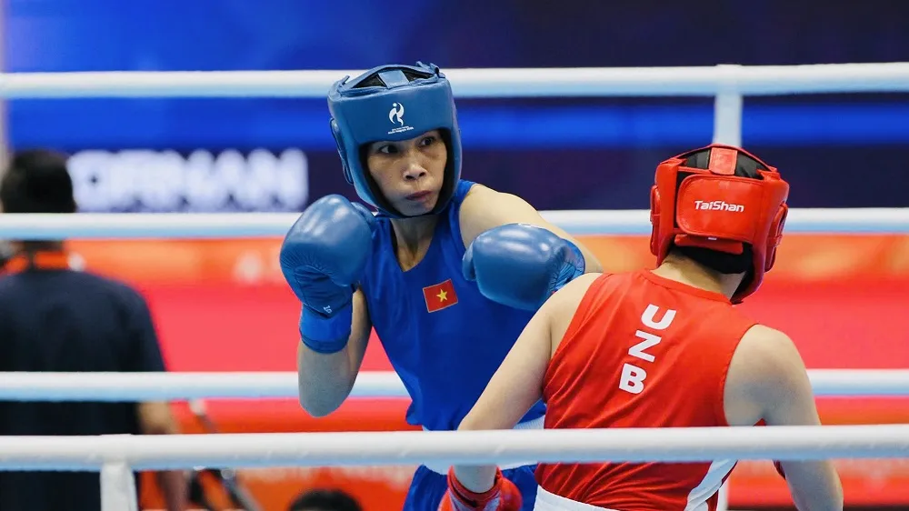 Hà Thị Linh (xanh) đã lỡ cơ hội đi tiếp tại ASIAD 20. Ảnh: LƯỢNG LƯỢNG