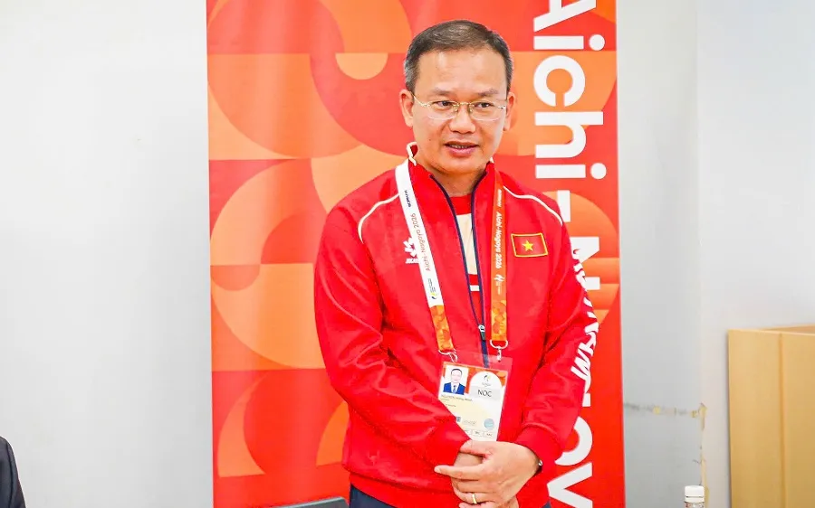 Trưởng đoàn thể thao Việt Nam tại ASIAD 20 Nguyễn Hồng Minh. Ảnh: LƯỢNG LƯỢNG