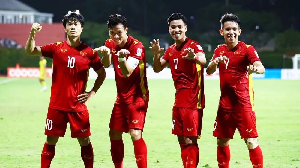 Các tuyển thủ Việt Nam ăn mừng chiến thắng. Ảnh: Getty