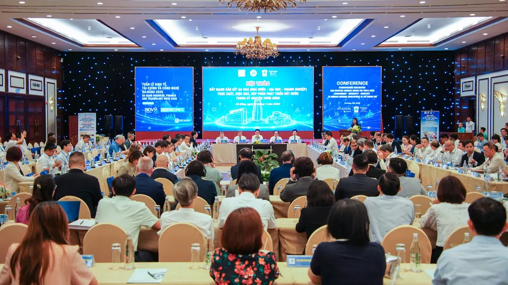 Đại học Đà Nẵng phối hợp UBND TP Đà Nẵng tổ chức hội thảo "Đẩy mạnh gắn kết ba nhà (Nhà nước - đại học - doanh nghiệp) thực chất, hiệu quả, góp phần phát triển đất nước trong kỷ nguyên vươn mình". Ảnh: XUÂN QUỲNH