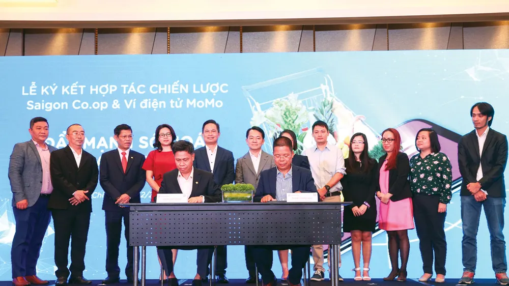Lãnh đạo Saigon Co.op và Ví MoMo ký kết hợp tác chiến lược thúc đẩy thanh toán không dùng tiền mặt 