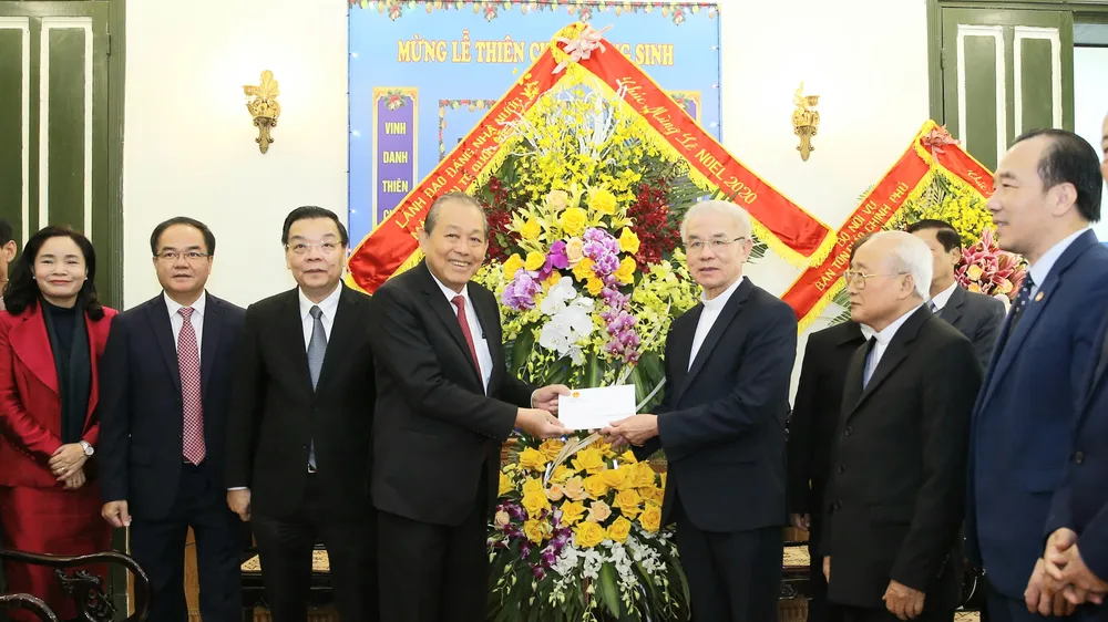 Phó Thủ tướng Thường trực Chính phủ Trương Hòa Bình thăm Ủy ban Đoàn kết công giáo Việt Nam. Ảnh VGP/LÊ SƠN
