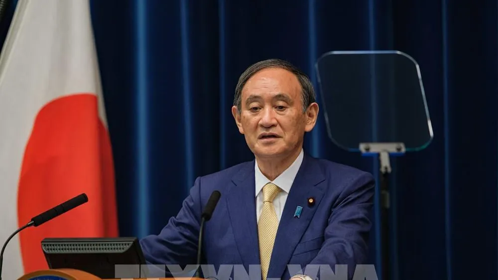 Thủ tướng Suga Yoshihide tại cuộc họp báo ở Tokyo, Nhật Bản. Ảnh: AFP/TTXVN