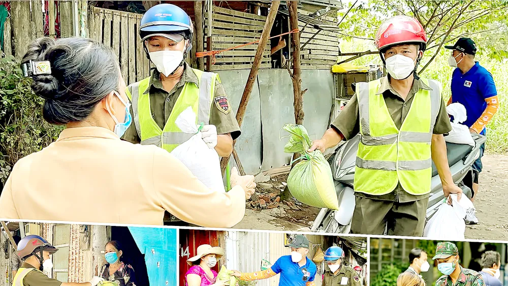 Công tác an sinh xã hội được TPHCM đẩy mạnh nhằm hỗ trợ người dân khó khăn do dịch Covid-19. Ảnh: HOÀNG HÙNG