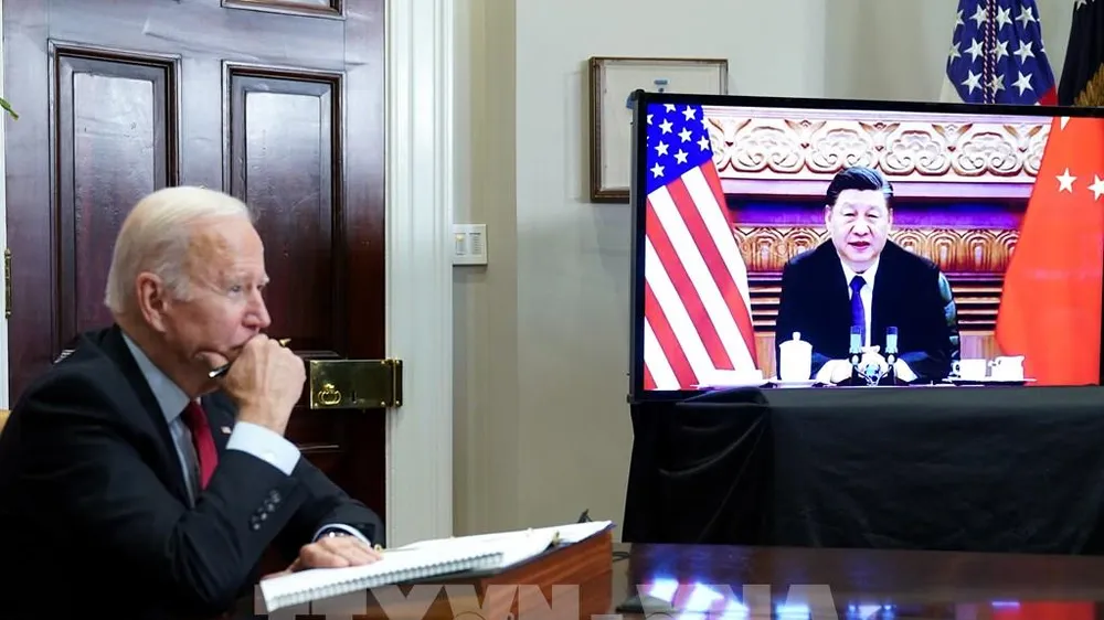 Tổng thống Mỹ Joe Biden và Chủ tịch Trung Quốc Tập Cận Bình tại hội nghị thượng đỉnh trực tuyến, ở Washington, DC., Mỹ ngày 15-11-2021. Ảnh: AFP/TTXVN