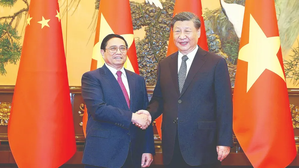 Thủ tướng Phạm Minh Chính hội kiến Tổng Bí thư, Chủ tịch Trung Quốc Tập Cận Bình. Ảnh: TTXVN