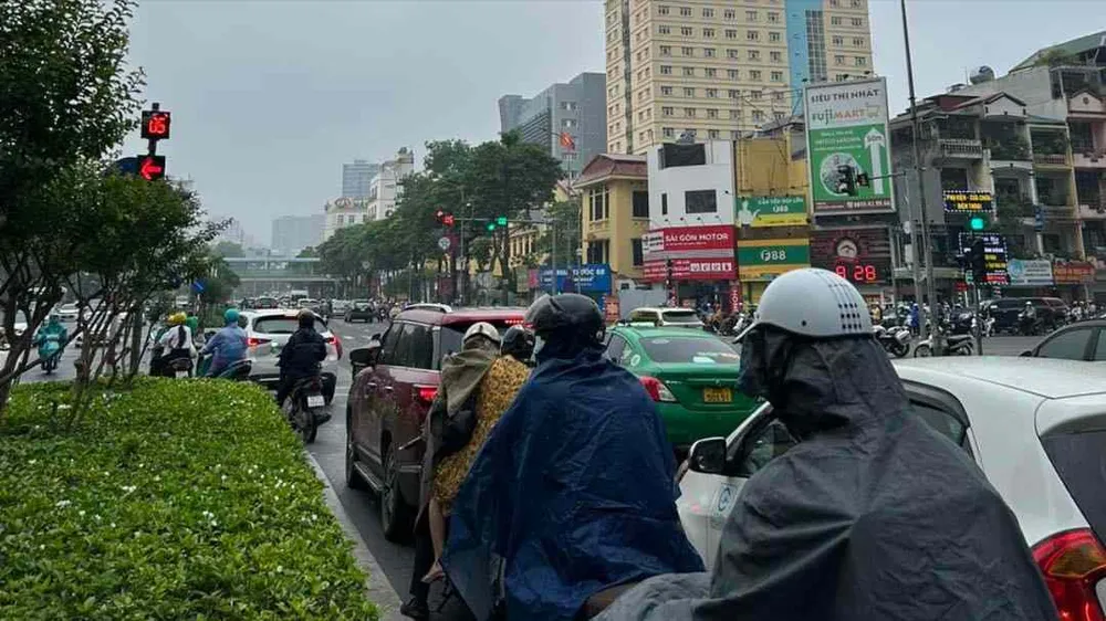 Miền Bắc mát mẻ nhờ có mưa rào diện rộng