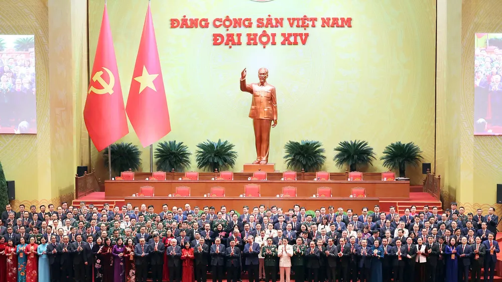Ban Chấp hành Trung ương Đảng khoá XIV ra mắt Đại hội, chiều 23-1. Ảnh: QUANG PHÚC