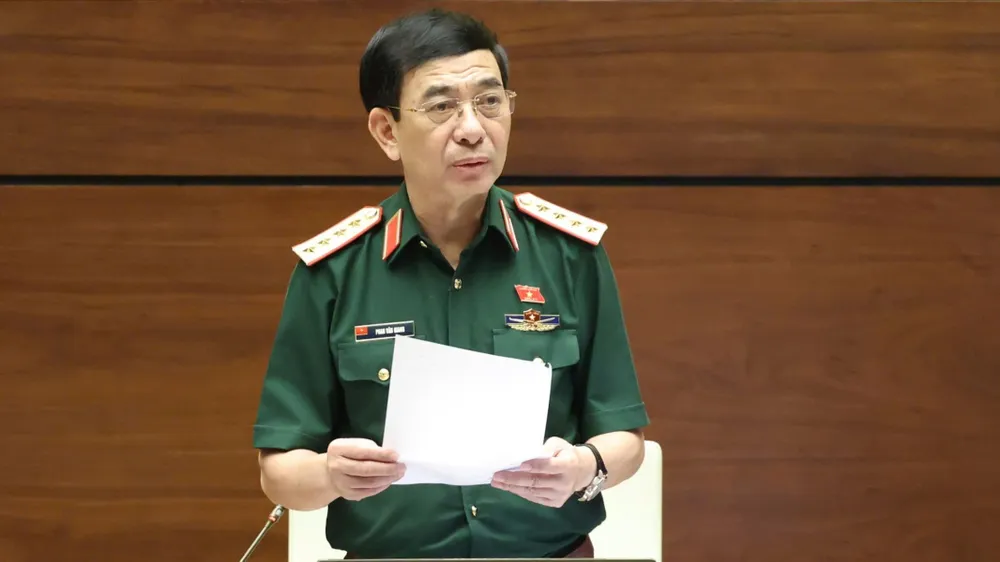 Đại tướng Phan Văn Giang, Phó Thủ tướng, Bộ trưởng Bộ Quốc phòng, phát biểu tại phiên họp. Ảnh: QUANG PHÚC 
