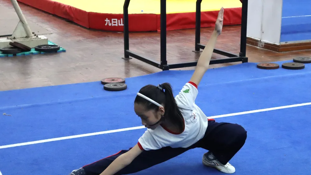 VĐV wushu TPHCM được tập luyện từ nhỏ để đảm bảo những yêu cầu nhanh, mạnh, dẻo, phản ứng nhanh. Ảnh: NGUYỄN ANH