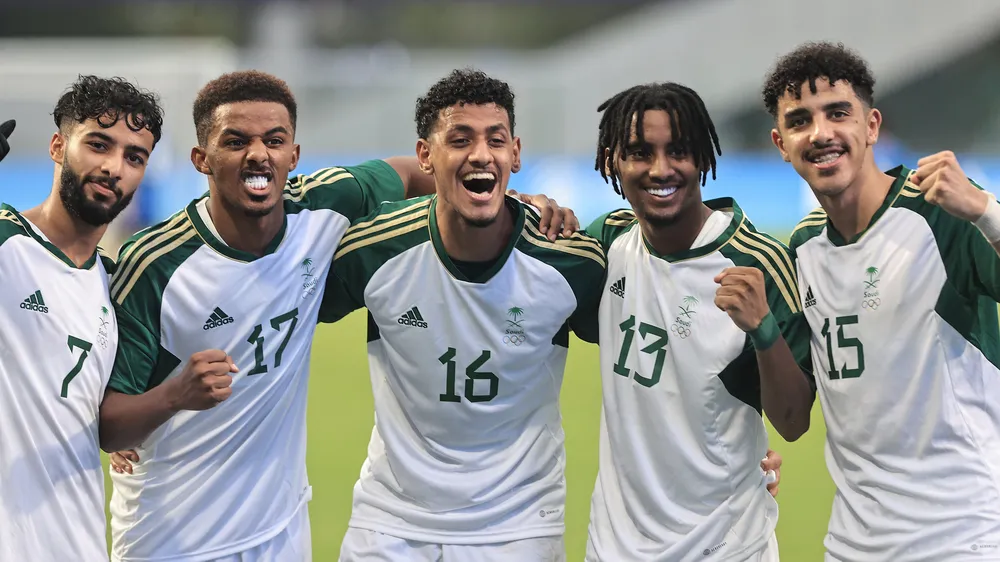 Niềm vui của các tuyển thủ Olympic Saudi Arabia. 