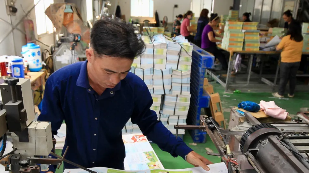 Hoạt động in ấn tại Công ty TNHH MTV In Sài Gòn Giải Phóng. Ảnh: DŨNG PHƯƠNG