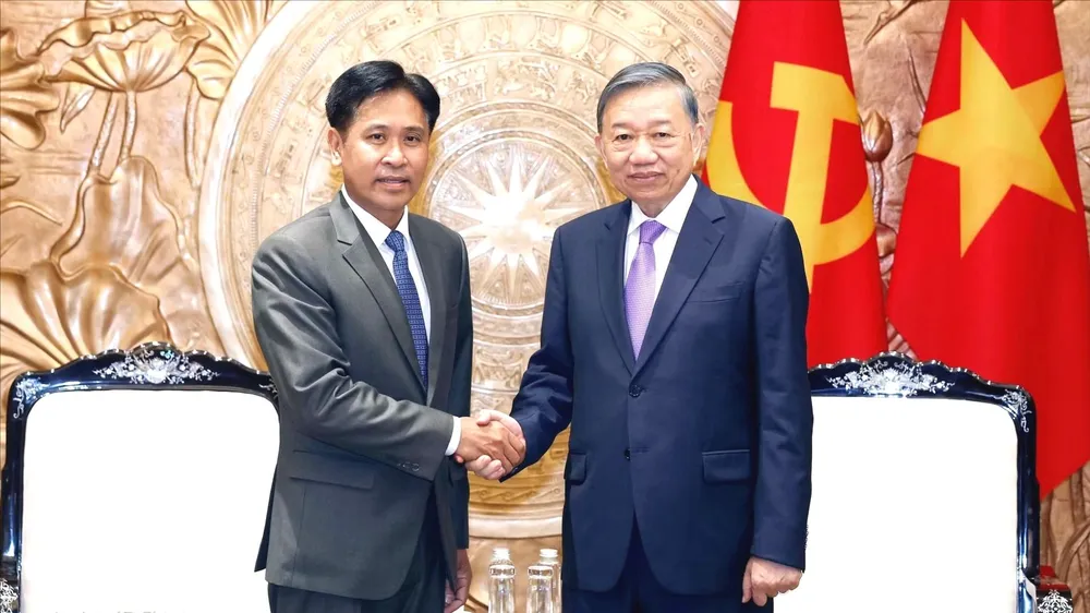 Tổng Bí thư, Chủ tịch nước Tô Lâm tiếp Chánh án Tòa án nhân dân tối cao Lào Phayvy Syboualypha. Ảnh: TTXVN