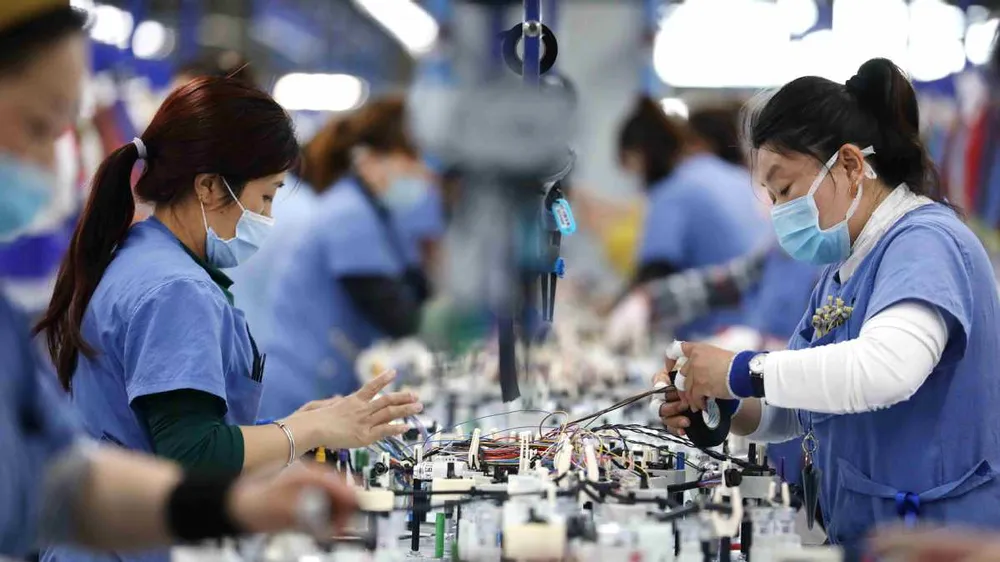 Kinh tế Trung Quốc tiệm cận mục tiêu tăng trưởng nửa đầu năm 2026