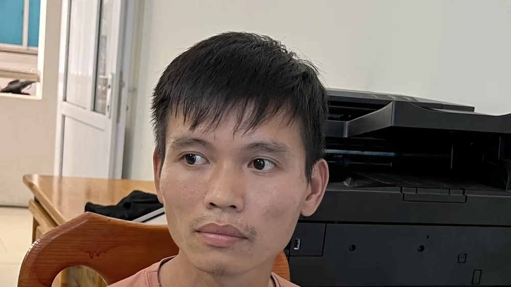 Dương tại cơ quan công an. Ảnh: ĐẠT NHÂN