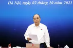 Chủ tịch nước Nguyễn Xuân Phúc: Sẽ có chính sách cụ thể hỗ trợ cho doanh nghiệp trong giai đoạn khó khăn hiện nay về tài chính, tiền tệ. Ảnh: TT 