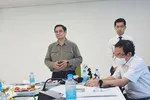 Thủ tướng làm việc với Công ty cổ phần công nghệ sinh học dược Nanogen - Khu công nghệ cao TPHCM. Ảnh: HOÀNG LỘC