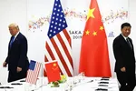 In this file photo taken on June 29, 2019 Chinese President Xi Jinping (R) and US President Donald Trump attend their bilateral meeting on the sidelines of the G20 Summit in Osaka. (AFP Photo)