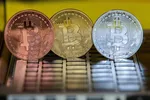 A visual representation of the cryptocurrency bitcoin at the “Bitcoin Change” shop in Tel Aviv, Israel. (Jack Guez/AFP/Getty Images)