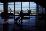 A terminal of Reagan National Airport in Arlington, Va., on March 17. PHOTO: MANDEL NGAN/AGENCE FRANCE-PRESSE/GETTY IMAGES