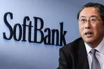 SoftBank Group CFO Yoshimitsu Goto says the company is committed to its original one-year deadline for selling off some $41 billioin in assets. (Nikkei Montage/ Source photo by Jun Takai)
