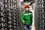 © Getty Images | A worker at an electricity storage system which is using batteries to balance the grid in Fontenelle near Dijon