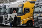 Lorry drivers at the Ashford International Truck Stop in Kent on Tuesday. Thousands of trucks are stuck on the English side of the Channel © Chris J Ratcliffe/Getty
