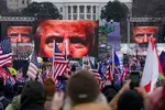 Supporters of Donald Trump attend a rally in Washington before many of them stormed the Capitol © John Minchillo/AP