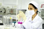 A woman works in a lab of a pharmaceutical firm in Hau Giang Province, southern Vietnam. Photo courtesy of the company.