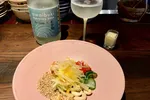 Craving something textured and aromatic? An Com’s green papaya salad, paired with sparkling Awaibuki sake from Tomita Shuzo, could be the answer. | ROBBIE SWINNERTON