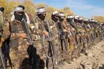 Các binh sĩ Taliban có vũ trang tham gia một buổi huấn luyện ở tỉnh Uruzgan ngày 3/12.
