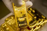 Giá vàng 5/12: Vàng vọt lên mức cao kỷ lục mới 2.152 USD/ounce rồi chững lại