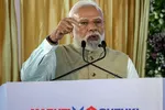 Narendra Modi phát biểu trước khán giả trong buổi ra mắt dây chuyền lắp ráp mới của Maruti Suzuki dành cho Suzuki e-Vitara, mẫu xe điện đầu tiên của Maruti, tại nhà máy Hansalpur, cách Ahmedabad khoảng 80 km, thuộc bang Gujarat, Ấn Độ vào ngày 26 tháng 8 năm 2025. 