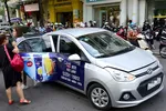 Kể từ ngày 5-12, hành khách đi xe công nghệ phải tốn thêm tiền, tài xế lo ế khách. - Ảnh: C.TRUNG