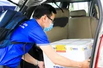 Vận chuyển vaccine Covid-19 đến Trung tâm Kiểm soát bệnh tật TP Đà Nẵng Ảnh: XUÂN QUỲNH