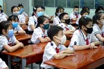Học sinh tiểu học trên địa bàn TPHCM trong một tiết học cuối năm học 2020-2021