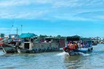 Chợ nổi Cái Răng. Ảnh: Báo Cần Thơ