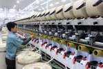 Sản xuất sợi tại Cụm Công nghiệp Vũ Ninh, huyện Kiến Xương. (Ảnh: Thế Duyệt/TTXVN)