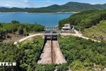 Tràn xả lũ Dốc Miếu đã cơ bản hoàn thành việc nâng cấp, sửa chữa hệ thống cơ khí. (Ảnh: Hữu Quyết/TTXVN) 