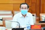 Ủy viên Bộ Chính trị, Bí thư Thành ủy TPHCM Nguyễn Văn Nên chủ trì cuộc họp. Ảnh: VIỆT DŨNG