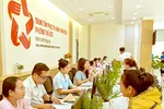 Người dân đến làm thủ tục tại Trung tâm Phục vụ Hành chính công phường Thủ Đức, TPHCM. Ảnh: VIỆT DŨNG