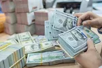 Giá USD ngân hàng giảm về sát mốc 25.000 đồng