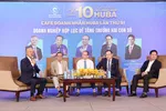 Đại biểu thảo luận giải pháp hợp lực để doanh nghiệp đồng hành cùng mục tiêu tăng trưởng 2 con số. Ảnh: MINH XUÂN