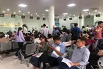 Người dân TPHCM thực hiện thủ tục đăng ký đất đai tại một chi nhánh