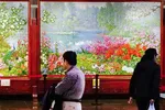 Paintings are displayed at a gallery handling North Korean art in Dandong, China. (Photo by Akira Kodaka)
