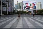 Foreign tourists walk at square of Central World in Bangkok, Thailand on March 20. Photographer: Vachira Vachira/NurPhoto via Getty Images