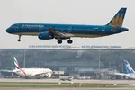 A Vietnam Airlines plane lands at Noi Bai airport in Hanoi. The carrier has suspended international service and slashed domestic flights. © Reuters