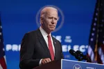  Ông Joe Biden họp báo sau cuộc gặp trực tuyến với ban chấp hành Hiệp Hội các Thống Đốc Quốc Gia vào tháng 11. Ảnh: AFP - JOE RAEDLE